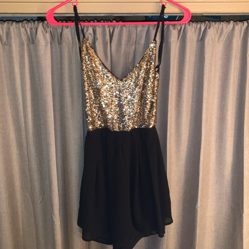Gold and black dressy romper from Windsor